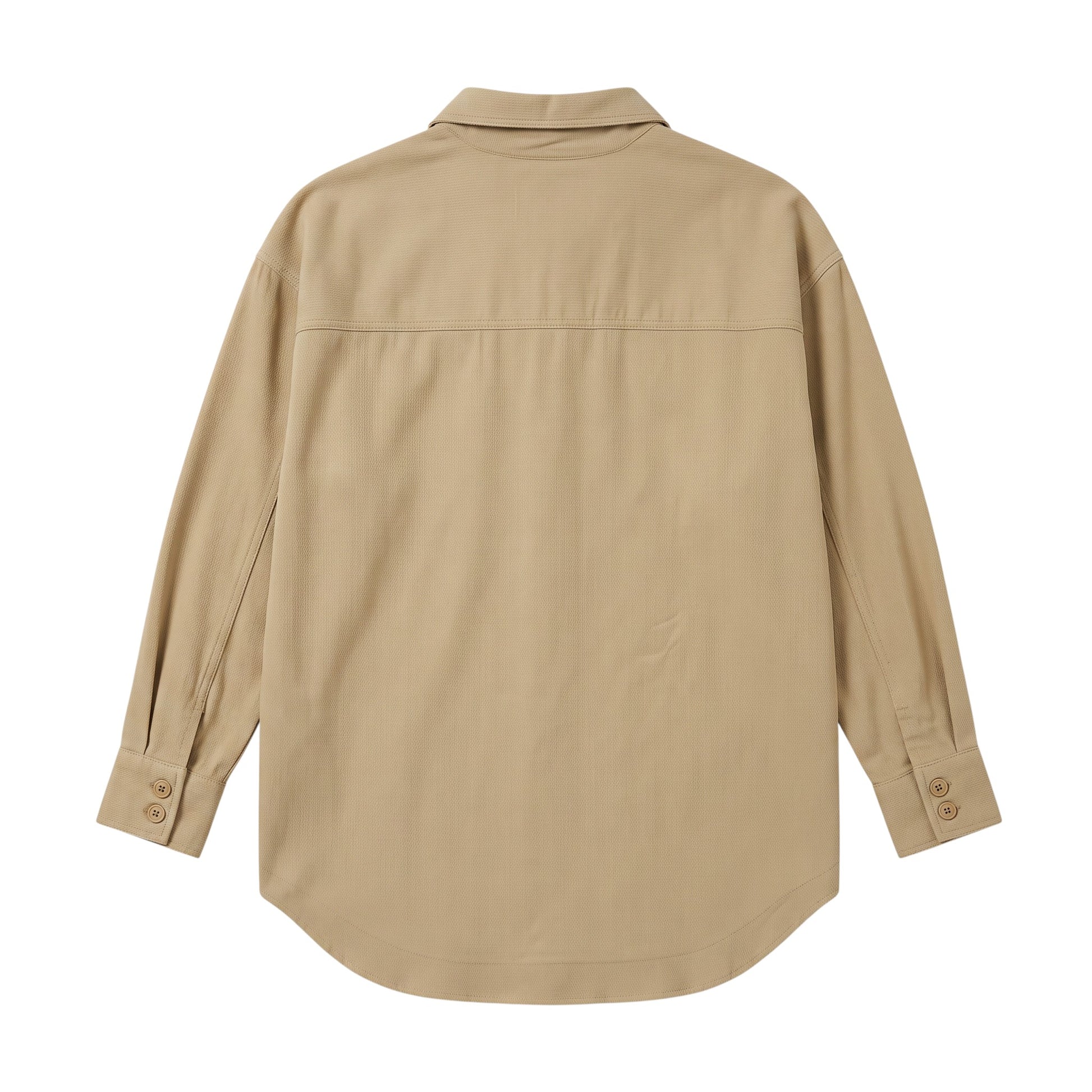 Back view of an oversized beige shacket from Creatively Chaotic Luxury Boutique with a relaxed shirt-jacket fit.