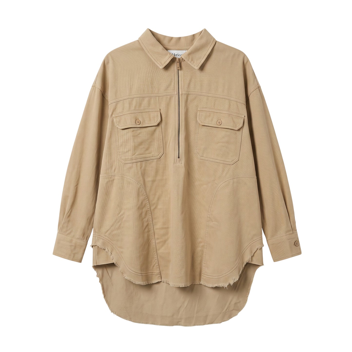Creatively Chaotic Luxury Boutique beige oversized shacket with a half-zip front, chest pockets, and raw hem detail.