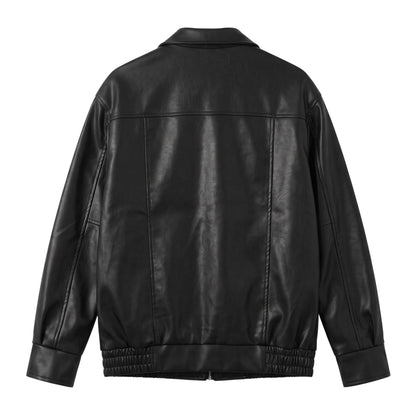 Back view of a black faux leather bomber jacket from Creatively Chaotic Luxury Boutique with a ribbed hem.